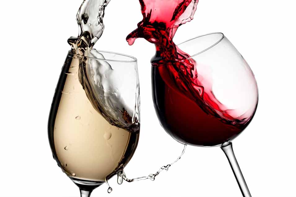 Image of red and white wine spilling