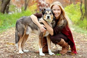 Picture of a woman and her dog outside