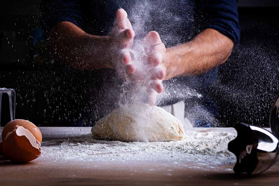 Picture of a man making bread