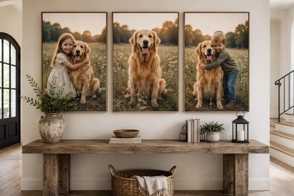 Farmhouse entryway with three framed portraits: girl and dog, dog alone, and boy with dog, above a rustic wood console table with neutral decor.