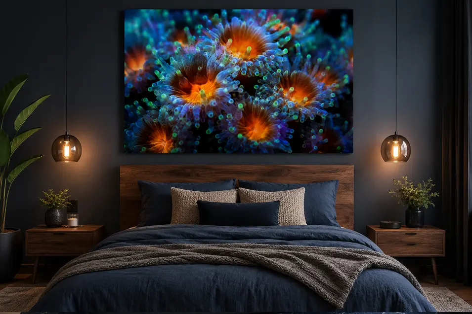 Modern spare bedroom with a dramatic fluorescent coral macro print above the bed, adding vibrant reef colors, texture and a bold contemporary focal point.